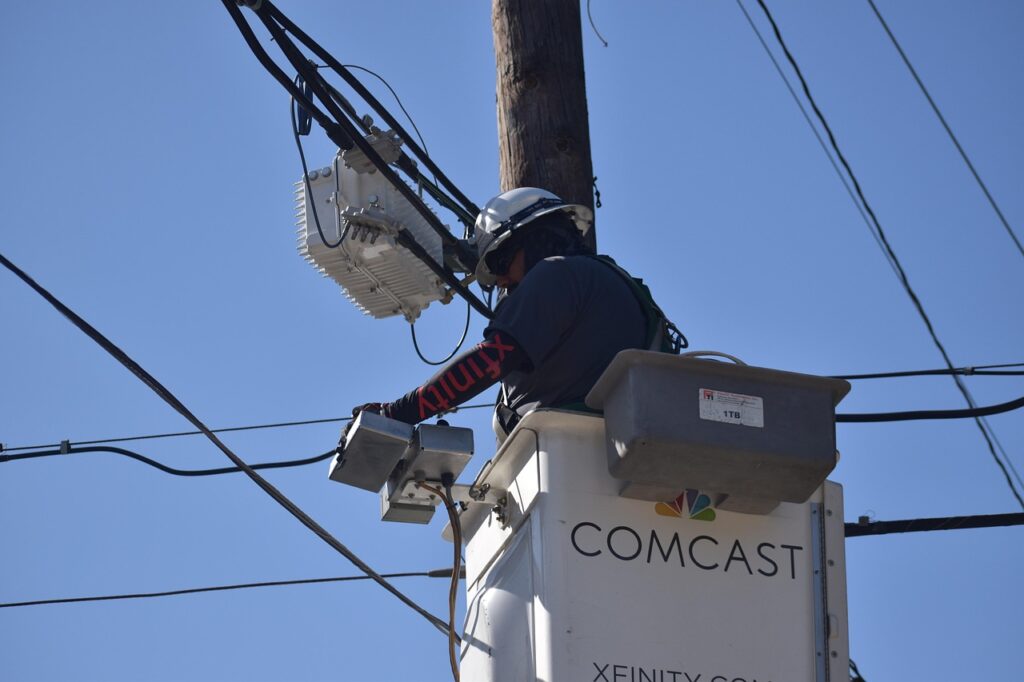 cable repairman, technician, comcast, xfinity, cable technician, cable repair, electrician, service, installation, maintenance, repair, electrical wires, electrical cables, utility pole, cat 5 wire, cat 5 cable, electricity, worker, professional, dangerous, job, hard work, hardhat, houston texas 2023-2024, dangerous work environment